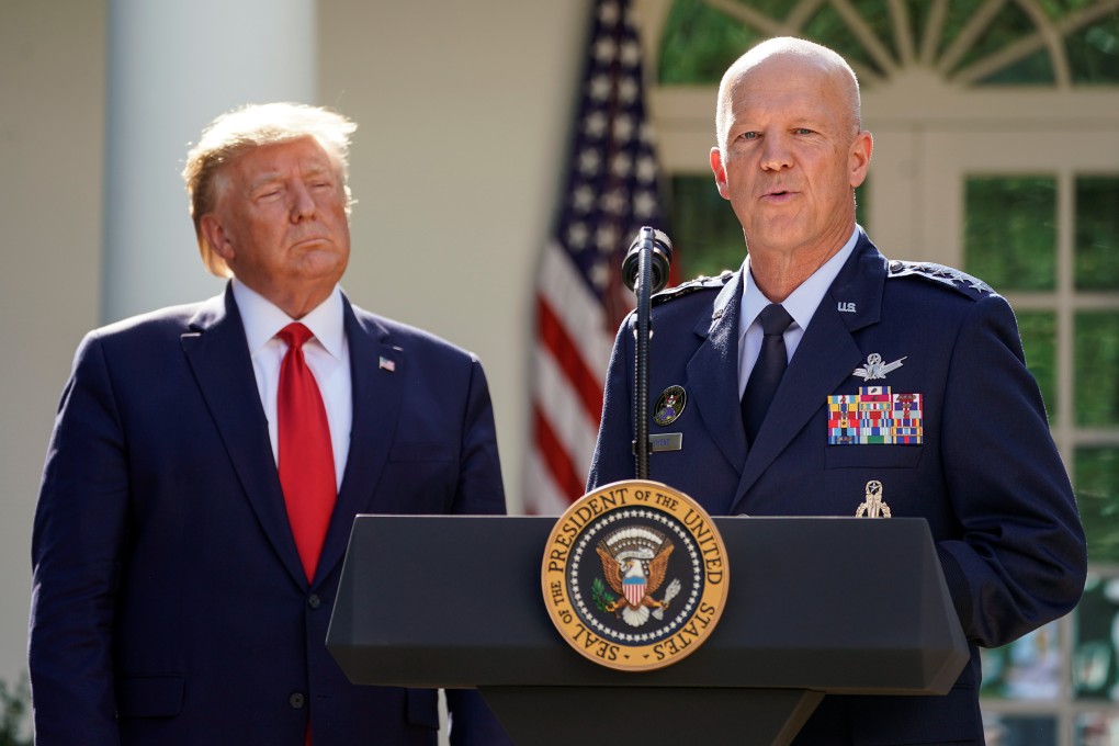 US President Donald Trump and US Air Force General John Raymond, commander of SpaceCom. Photo: Reuters