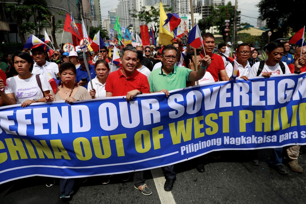 Filipino activists protest outside the Chinese embassy in April. Photo: Reuters