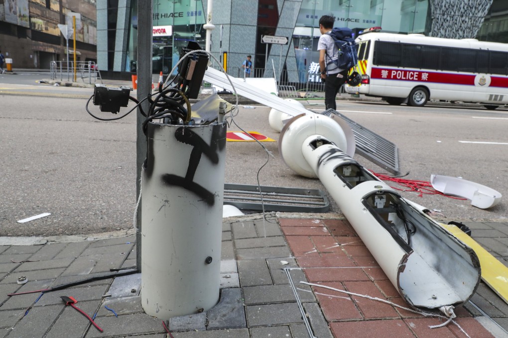 One of the damaged smart lamp posts on Sheung Yuet Road in Kowloon Bay after an extradition bill protest on August 24. Concerns were raised over whether the cameras on the lamp posts installed for functions such as monitoring real-time traffic were surveillance tools for the government. Photo: Edmond So