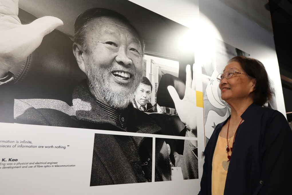 Gwen Kao Wong, wife of Nobel physics laureate Charles Kao Kuen, pictured with a photograph of her late husband at the South China Morning Post office. Photo: Roy Issa