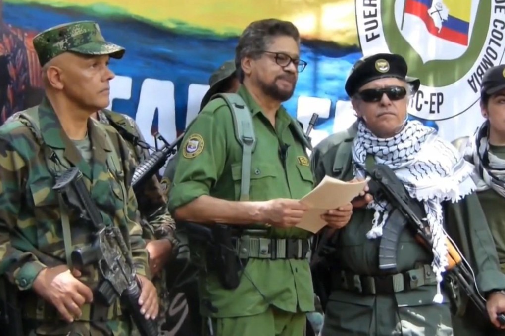 Former FARC leader Ivan Marquez, centre, and other ex-commanders announced that they are taking up arms again on Thursday. Photo: EPA