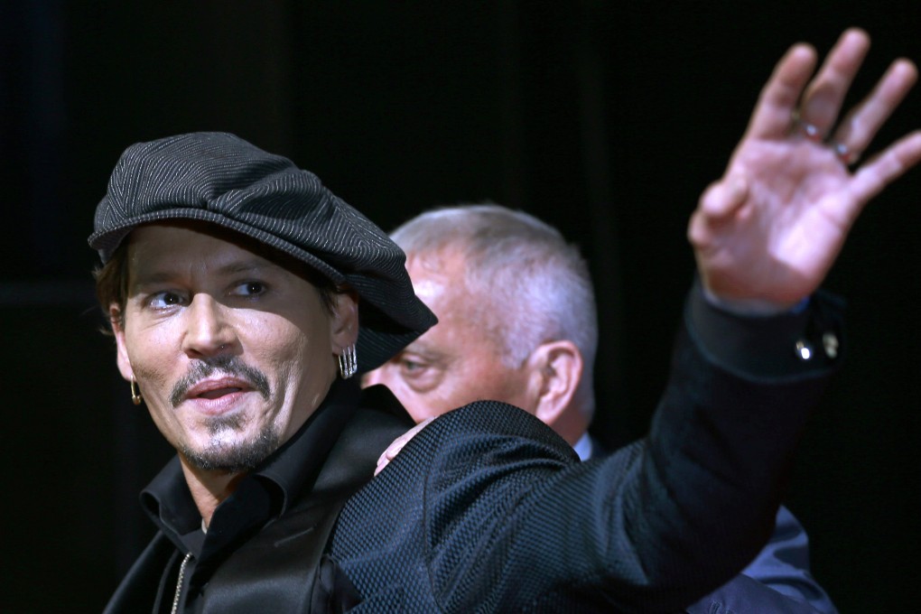 US actor Johnny Depp appeared in the ad playing a guitar. Photo: AP