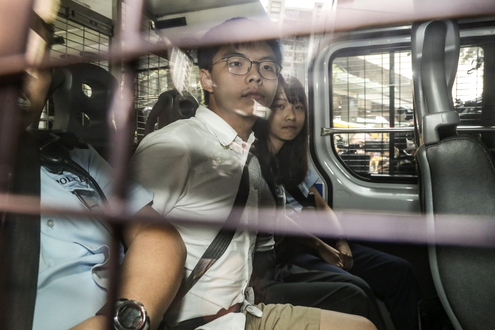 Joshua Wong and Agnes Chow were detained on a number of charges. Photo: Edmond So