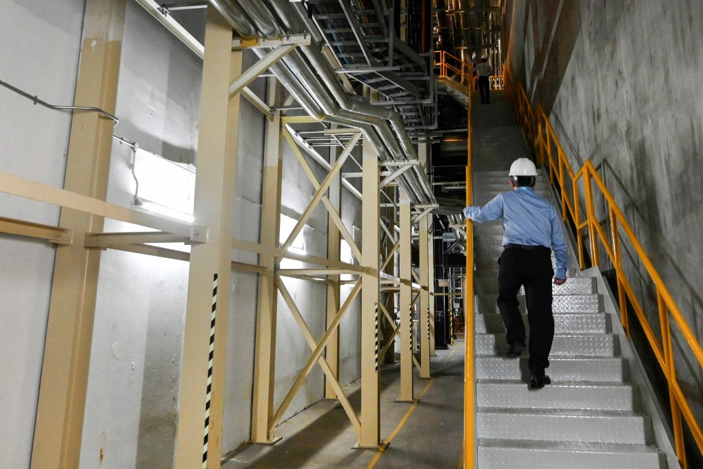 A worker in the underground cooling system installation of Singapore’s Marina Bay Sands resort. Photo: AFP
