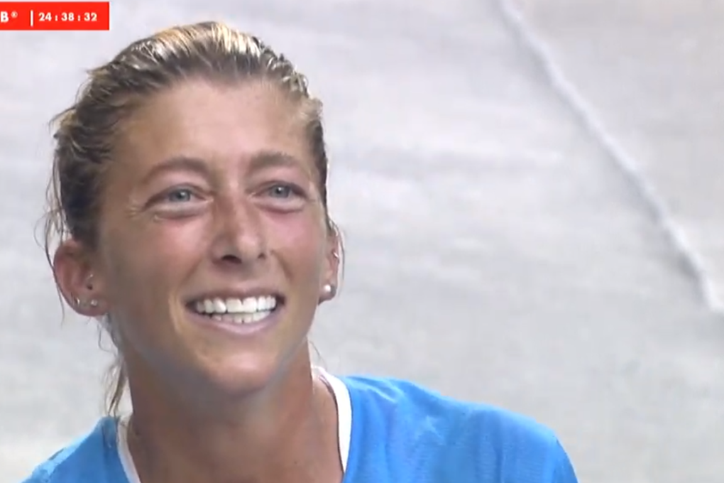 Dauwalter wins the UTMB 2019, sporting her trademark irrepressible smile. Photos: UTMB TV