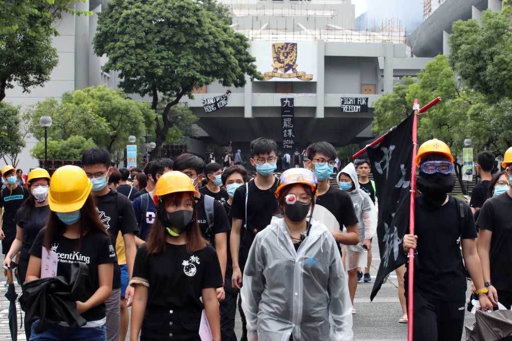 Students wear protective gear for a sit-in at Chinese University. Photo: Felix Wong