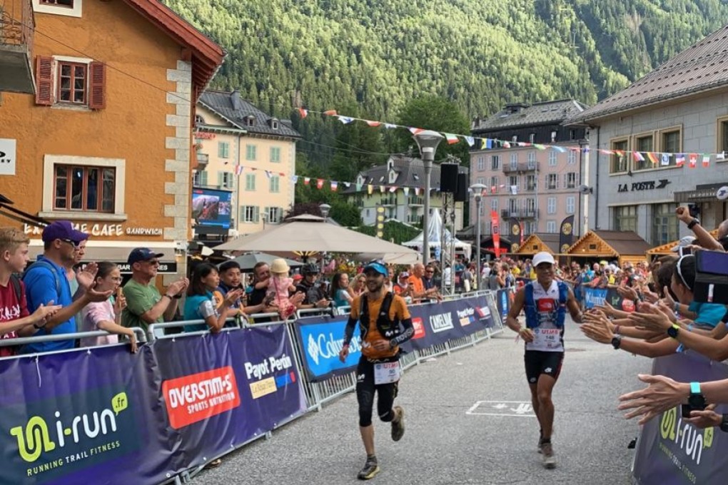 Wong Ho-chung and Joaquin Lopez approach the finish line, neck and neck, after 171km of running. Photo: Ryan Blair