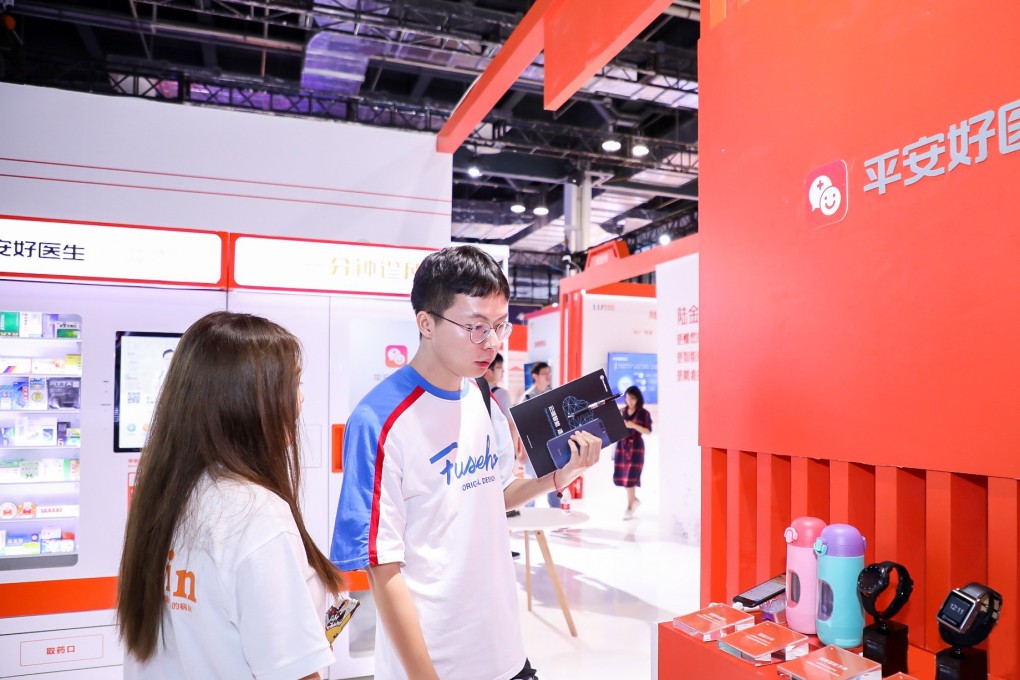Visitors to the World Artificial Intelligence Conference in Shanghai checking out smart gadgets displayed by Ping An Good Doctor on August 29, 2019. Photo: SCMP/Handout