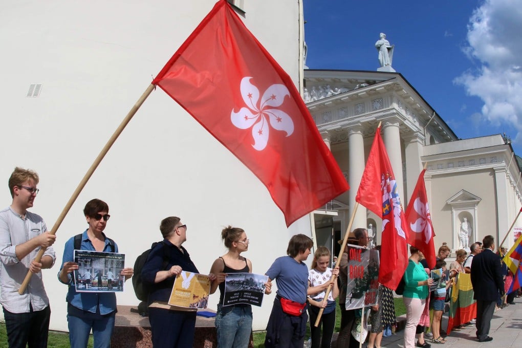 Hundreds of Lithuanians formed human chains on August 23 in a show of support to Hong Kong’s anti-government protests. Photo: AFP