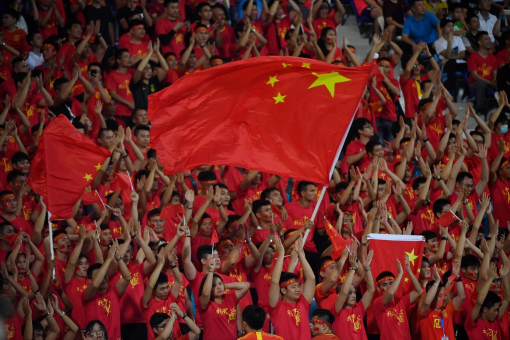 Chinese supporters during a friendly match against Palestine in 2018. Photo: AFP