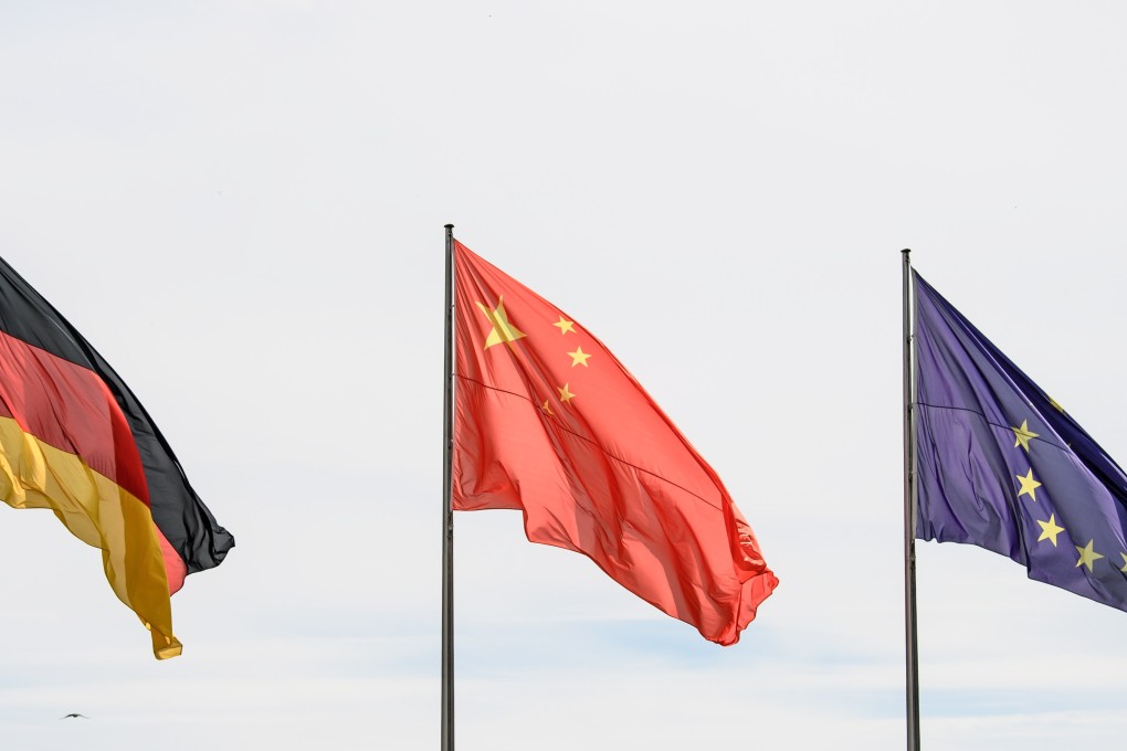 The German, Chinese and EU flags fly in Berlin, Germany, in readiness for German-Chinese bilateral government talks last year. Just as Germany sits at the centre of the EU, China could one day be the leader of a future Asian Union – if it heeds the lessons of history. Photo: EPA-EFE
