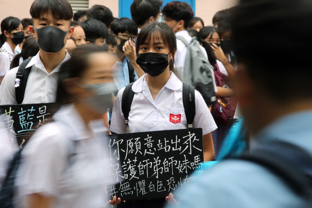 Students at Chinese Foundation Secondary School protest outside the school after they said they were threatened with expulsion they boycotted classes. Photo: Dickson Lee