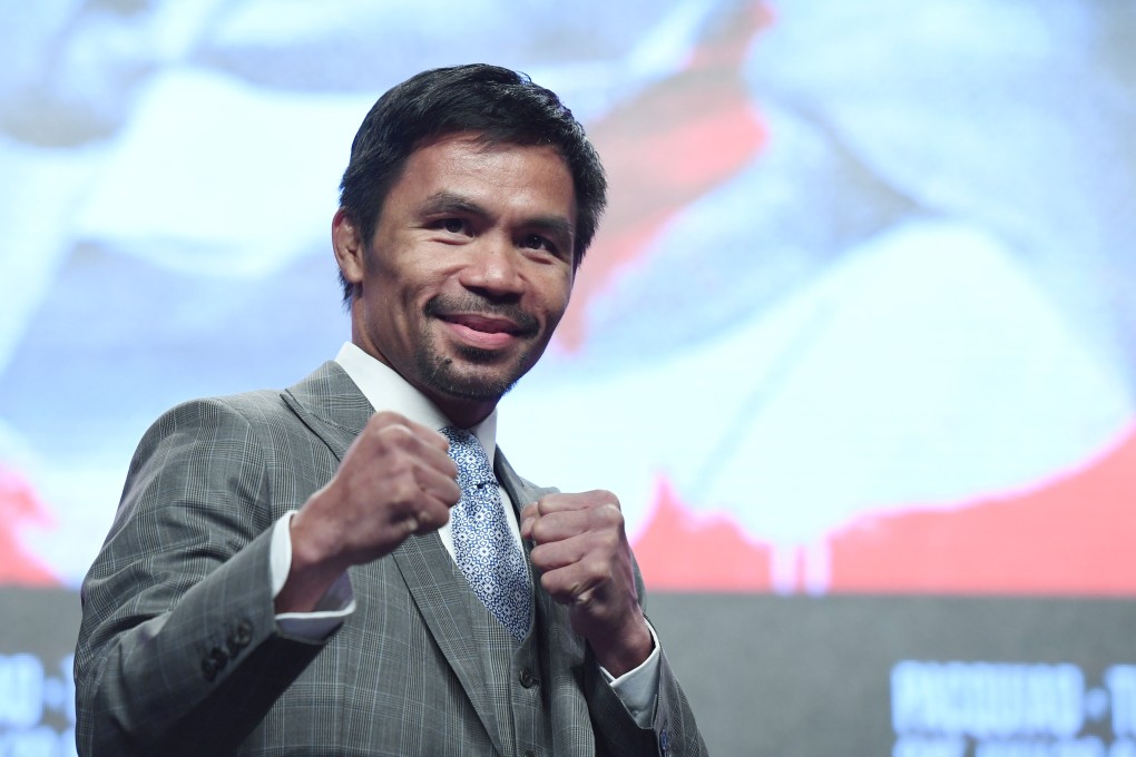 At Manny Pacquiao’s first major concert on Sunday, he sang songs from his own album which has sold thousands. Photo: AFP