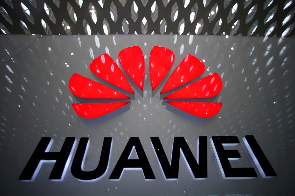 FILE PHOTO: A Huawei company logo is pictured at the Shenzhen International Airport in Shenzhen, Guangdong province, China July 22, 2019. REUTERS/Aly Song/File Photo