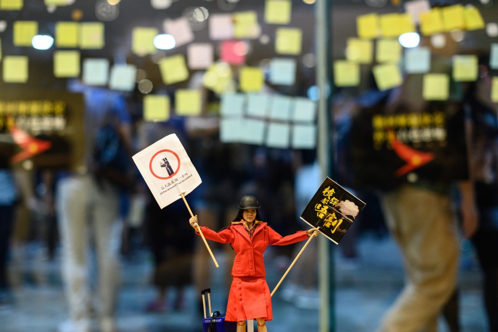 A flight attendant doll is placed inside a shopping mall in Hong Kong during a rally on August 28 to support Cathay Pacific staff amid the ongoing anti-government protests. Photo: AFP
