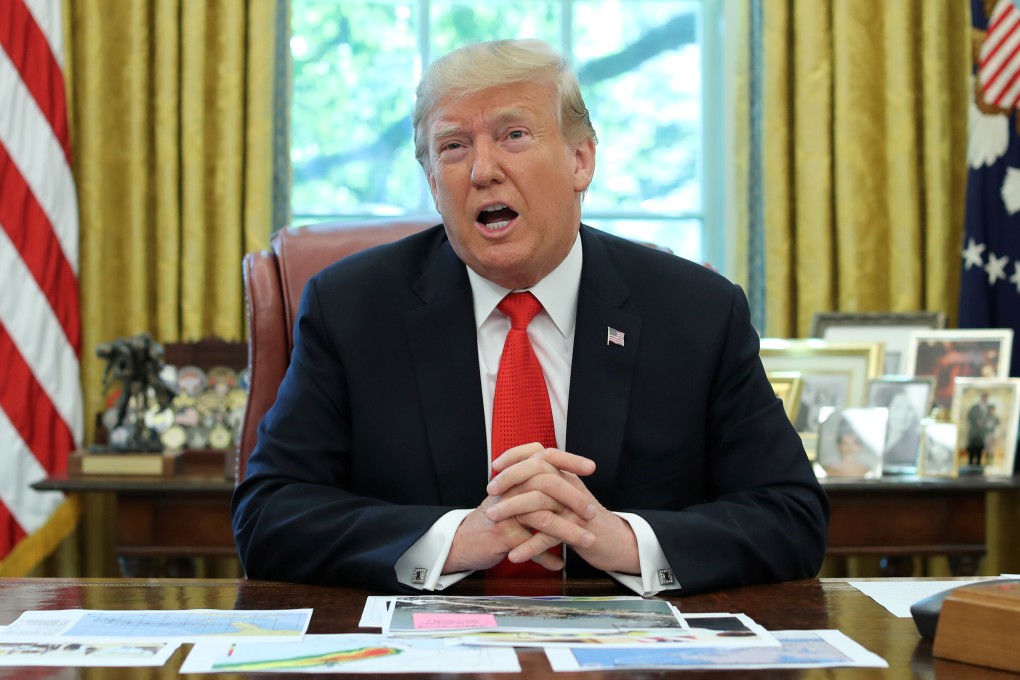 President Donald Trump talks to reporters. Photo: Reuters