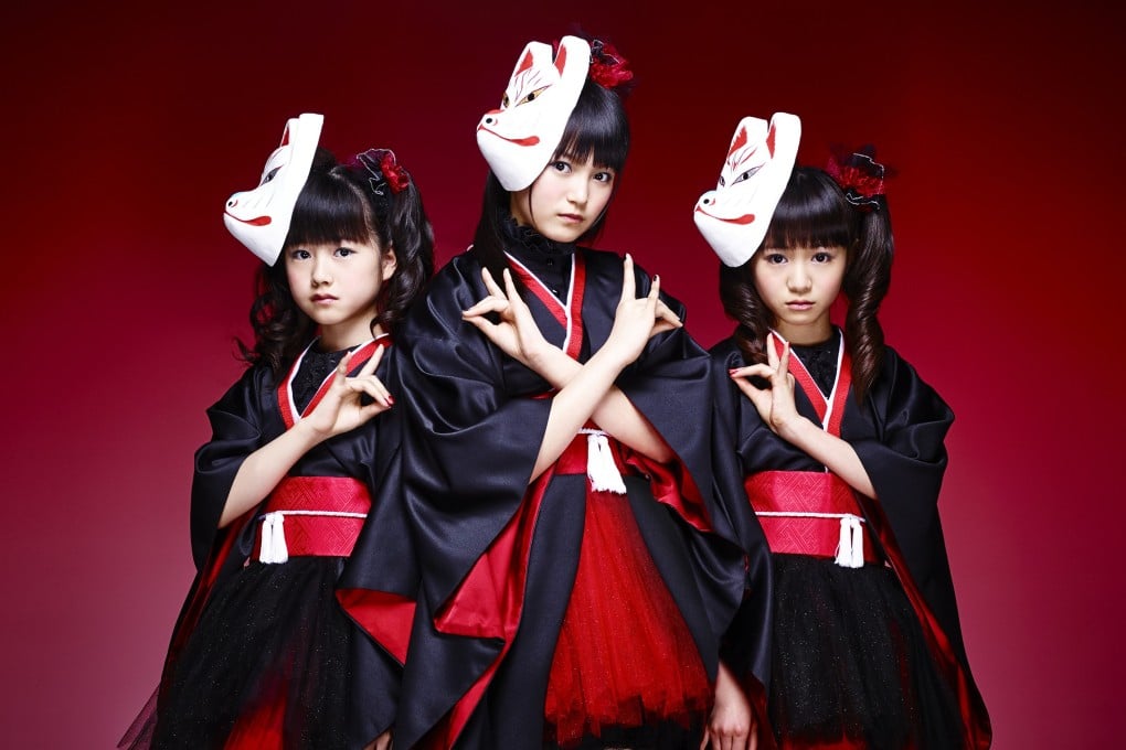 japanese metal guy in dress Japan's Hairiest Metal Entertainer Invites You To 'Enjoy And Taste Many Japanese Products'