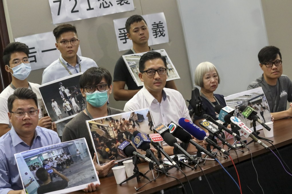 Democratic Party lawmaker Lam Cheuk-ting (centre) hopes legal action will force police to explain their stance on the Yuen Long attack and adopt corrective measures. Photo: K.Y. Cheng