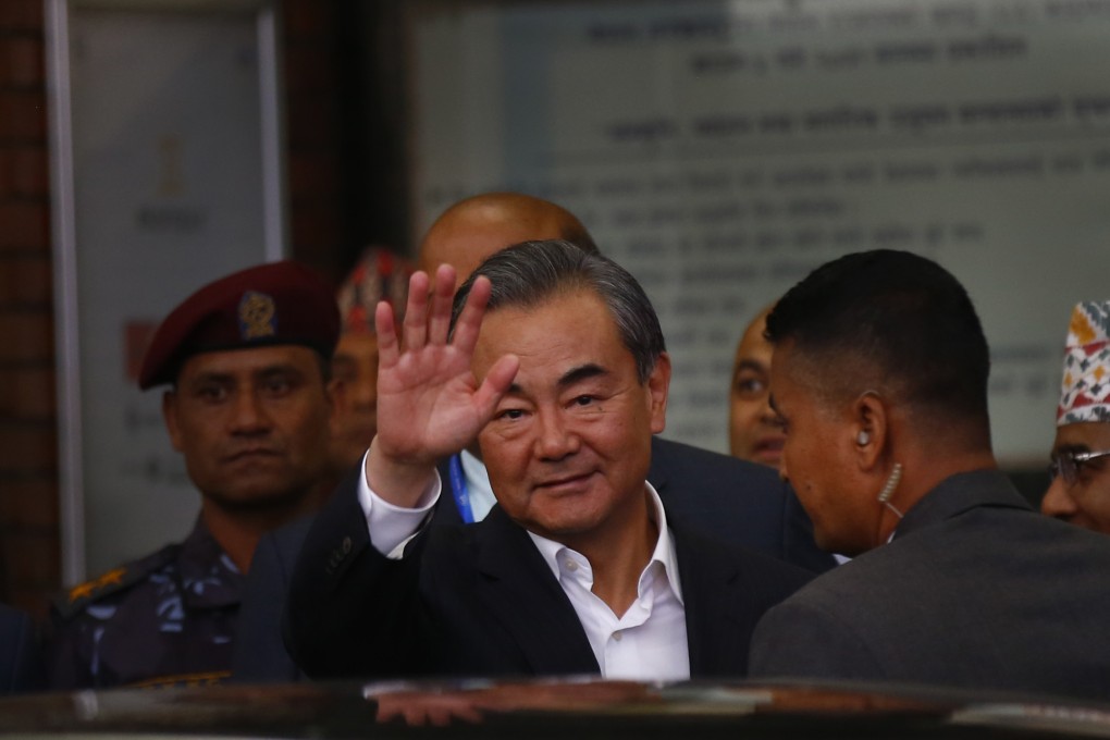 Wang Yi, pictured arriving in Nepal on Sunday, says China firmly supported the Pakistani government. Photo: DPA