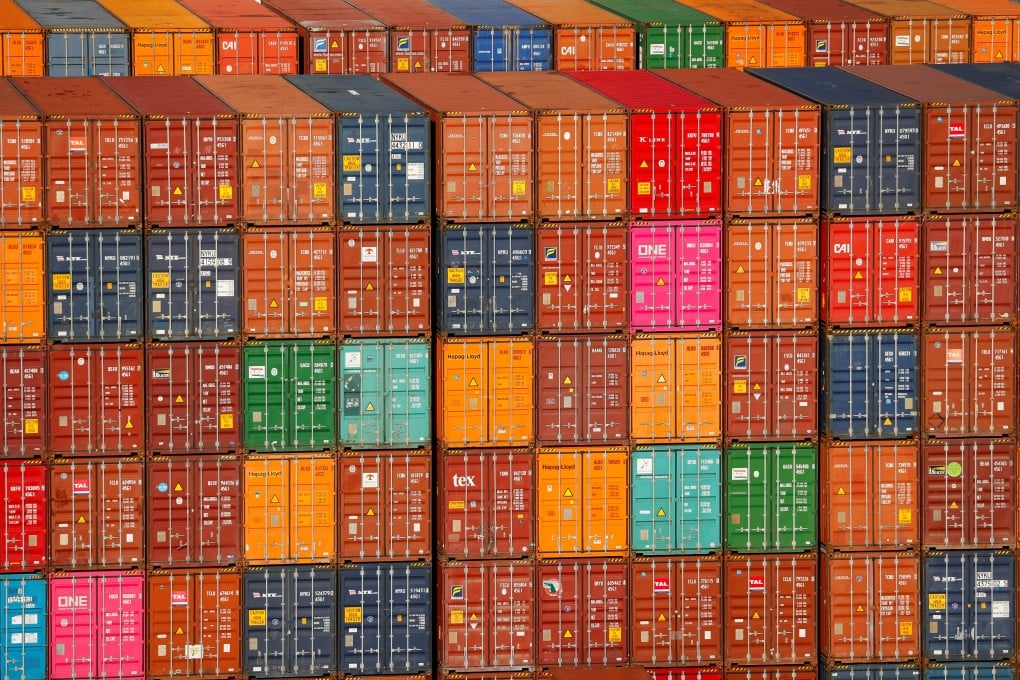 Shipping containers are stacked at the Port of Los Angeles in California. Investment bank CLSA thinks global trade could turn negative next year. Photo: Reuters