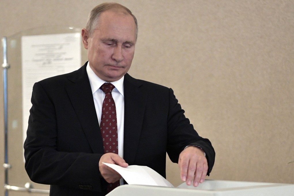 Russian President Vladimir Putin casts his vote at a polling station during to the Moscow city Duma elections. Photo: AP