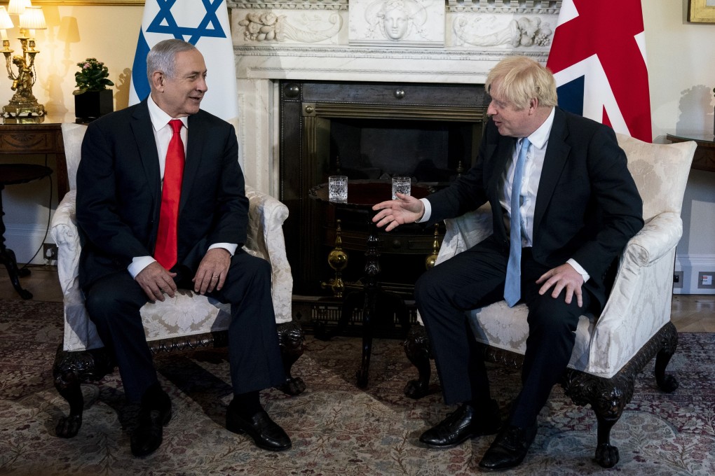Israeli Prime Minister Benjamin Netanyahu (left) talks to British Prime Minister Boris Johnson at No 10 Downing Street in London on Thursday. Photo: Bloomberg