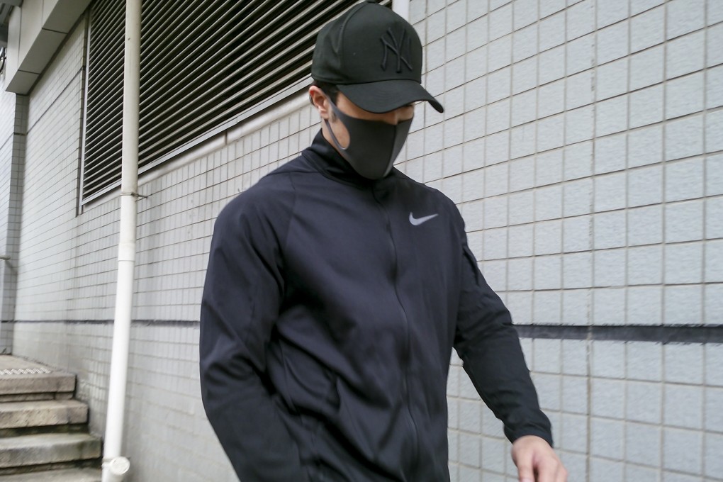 Fitness coach Au Chuen-shun leaves Kowloon City Court after being ordered to serve 90 hours of community service. Photo: Brian Wong