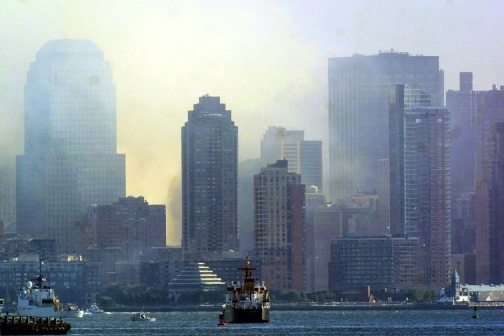 After the collapse of the Twin Towers, a cloud hung over lower Manhattan. File photo: AFP