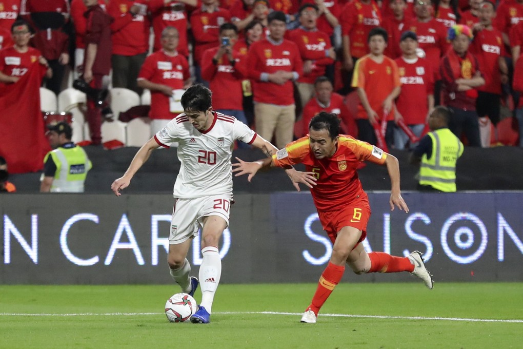 Iran’s Sardar Azmoun dribbles past China’s Feng Xiaoting in the 2019 AFC Asian Cup quarter-final. Photo: Xinhua