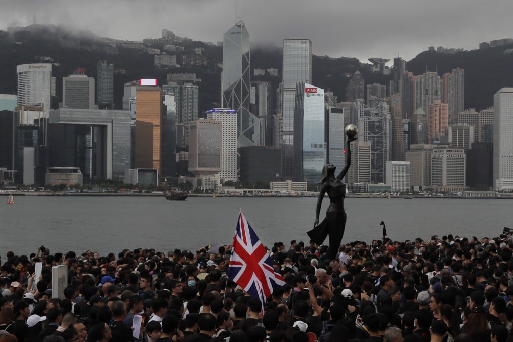 A British flag is seen during a protest in Hong Kong. Photo: AP