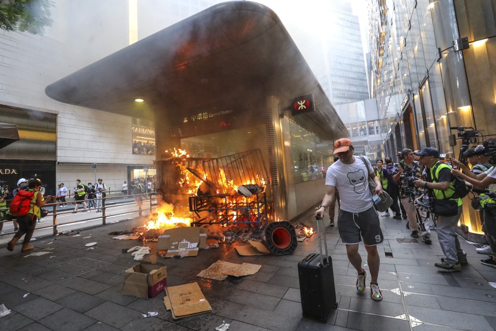 Protesters started a fire at an entrance to Central MTR station on September 8. Photo: Dickson Lee