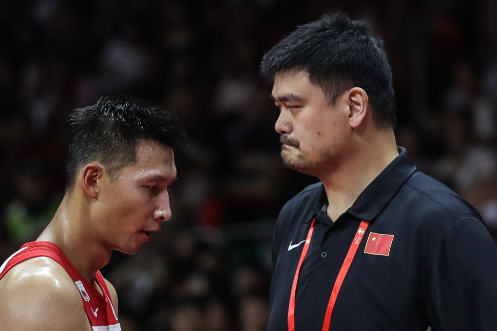 Yao Ming (right) and Yi Jianlian react after the loss to Nigeria at the Fiba World Cup. Photo: Xinhua