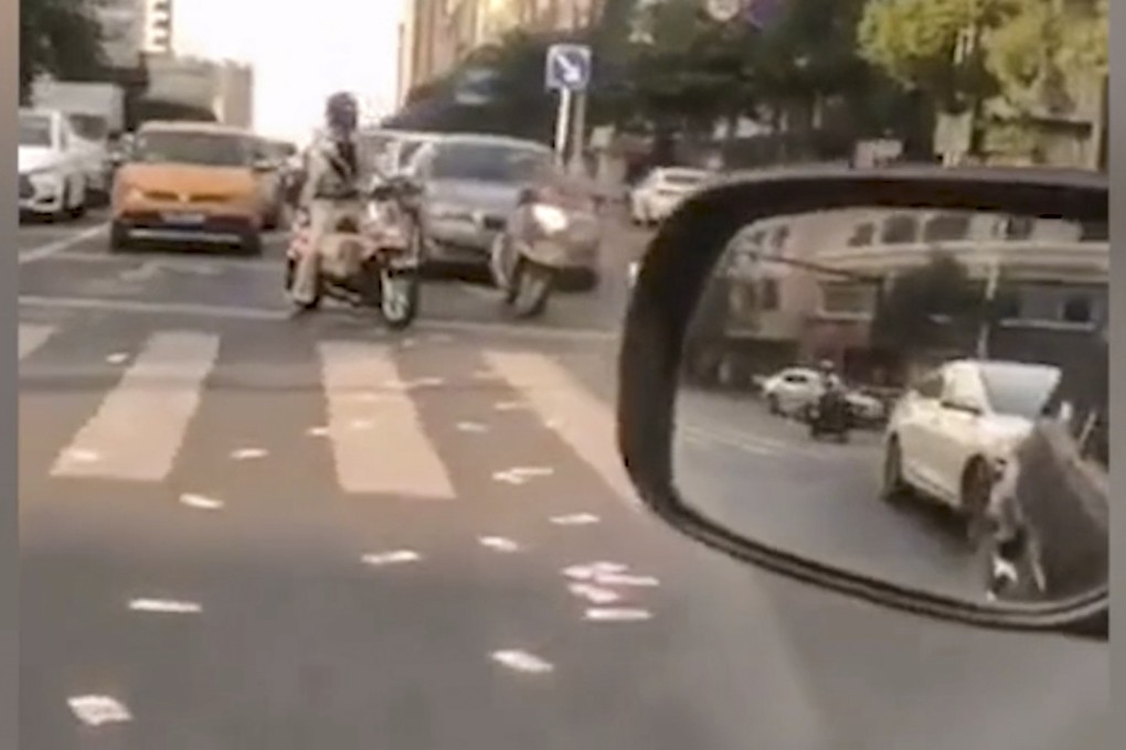 The man from Shishi city in Fujian province who tossed US$14,000 into the air after a bad day at work has asked for help in getting it back. Photo: Weibo