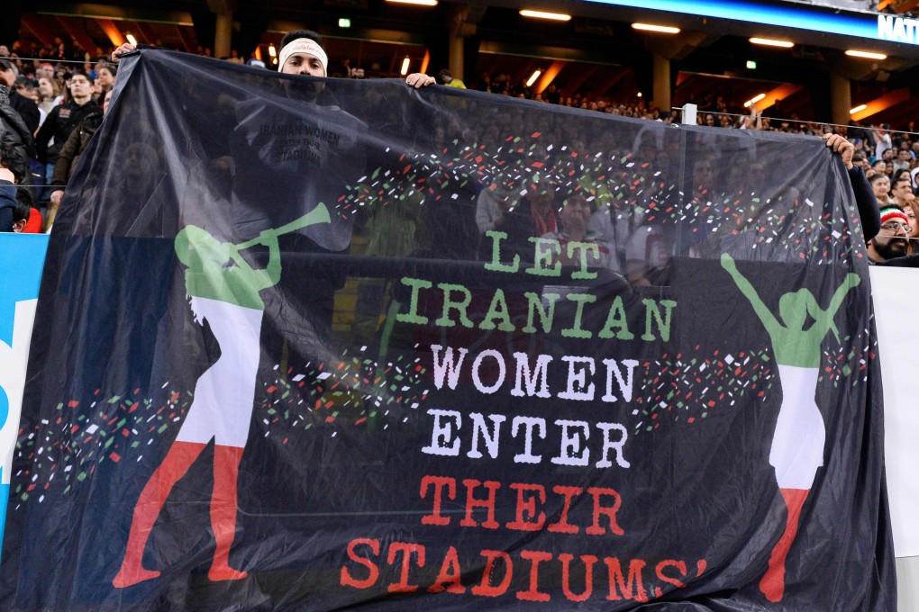 Fans hold a banner reading “Let Iranian women enter their stadiums” during the friendly international football match between Sweden and Iran at the Friends Arena in Solna near Stockholm in March 2015. File photo: AFP