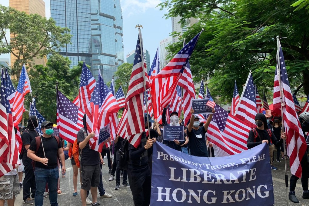 Anti-government protesters wave American flags at Chater Garden in Central on September 8, the day thousands marched to the US consulate, requesting US assistance for their cause. Photo: Simone McCarthy