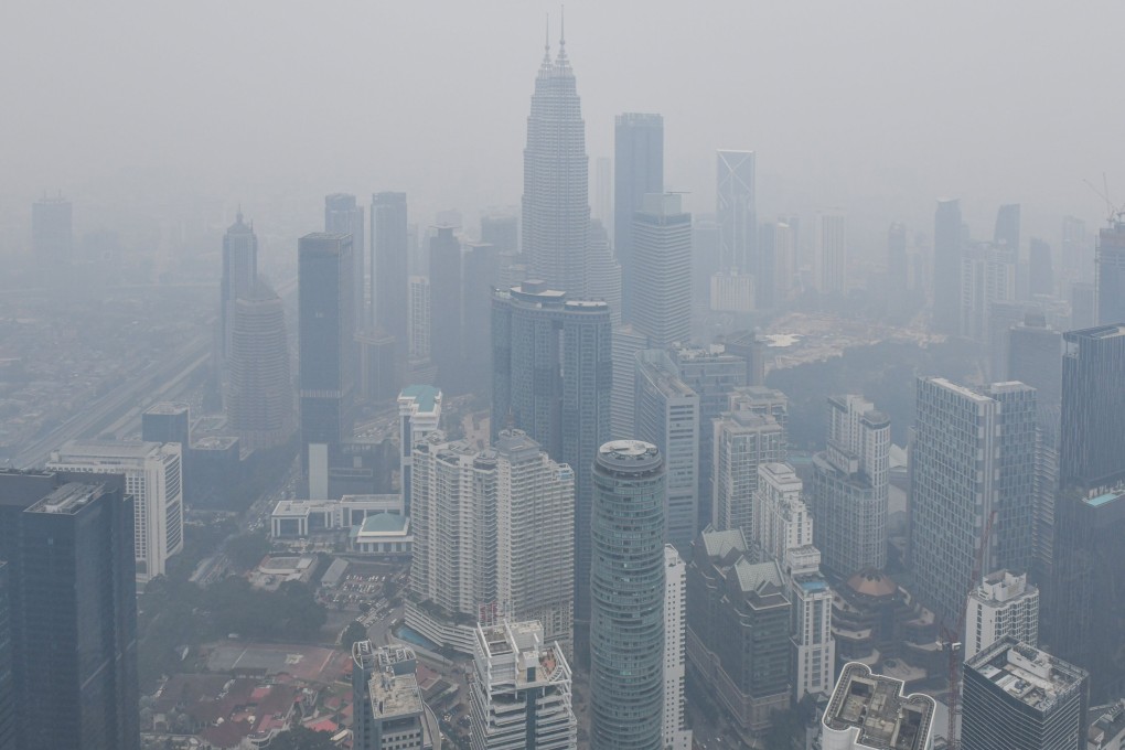 The Kuala Lumpur skyline, including the Petronas Twin Towers, is shrouded in haze on September 11, 2019. Photo: AFP