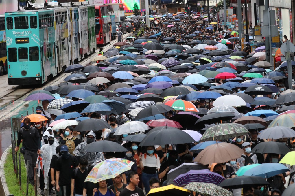 Anti-government protesters on Hennessy Road in Causeway Bay during a banned march on August 31. Photo: K.Y. Cheng