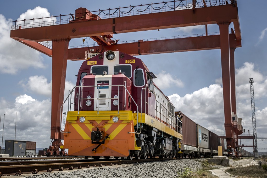 A Kenya Railways goods train pulls shipping containers as it departs from the port station on the Mombasa-Nairobi Standard Gauge Railway line in Mombasa, Kenya. The prime contractor was the China Road and Bridge Corporation, which hired 25,000 Kenyans to work on the railway. Photo: Bloomberg