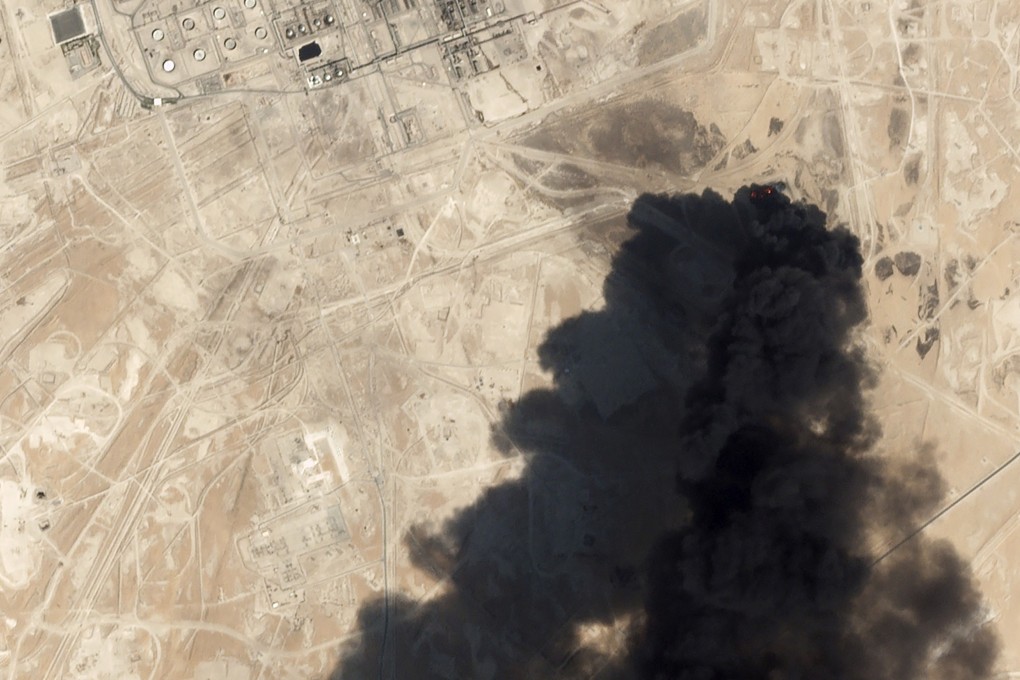 A satellite image from Planet Labs shows thick black smoke rising from Saudi Aramco's Abqaiq oil processing facility in Buqyaq, Saudi Arabia. Photo: AP