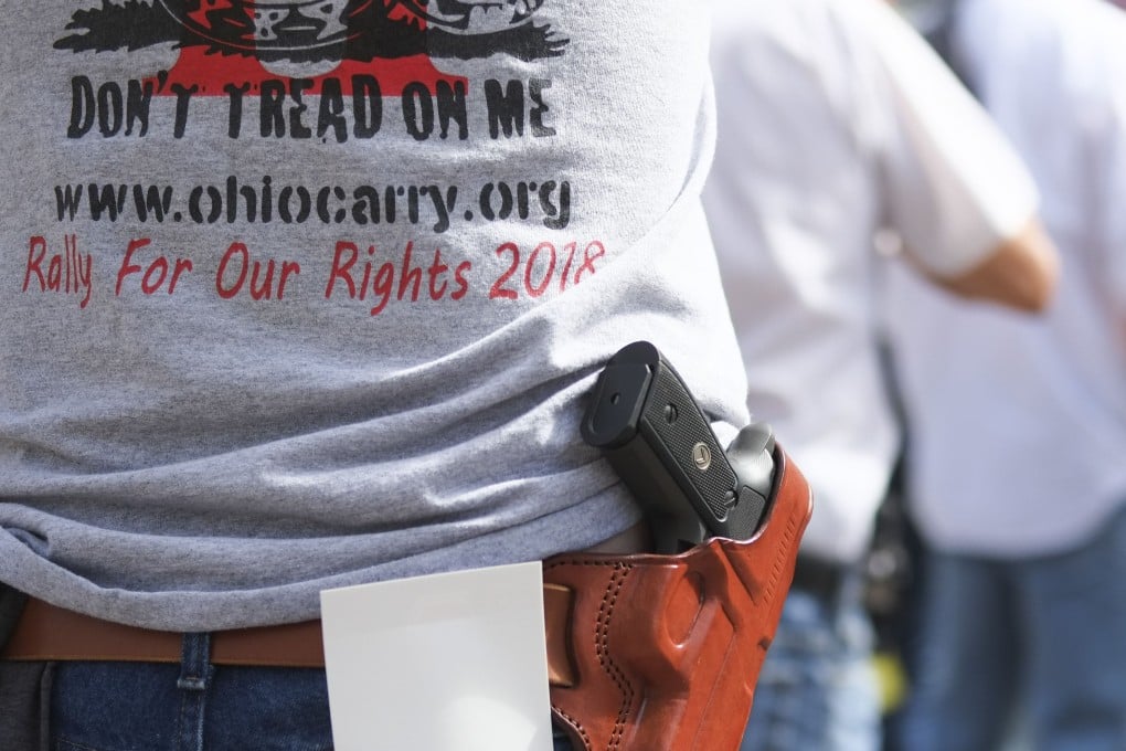 Gun owners and second amendment advocates gather at the Ohio State House to protest gun control legislation. Photo: AFP