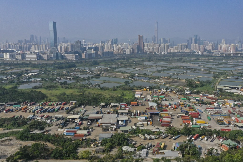 Farmland owned by companies linked to New World Development in Yuen Long, with Shenzhen’s Futian district at the back. The company holds 16 million sq ft of farmland, according to a Bank of America Merrill Lynch report. Photo: Roy Issa