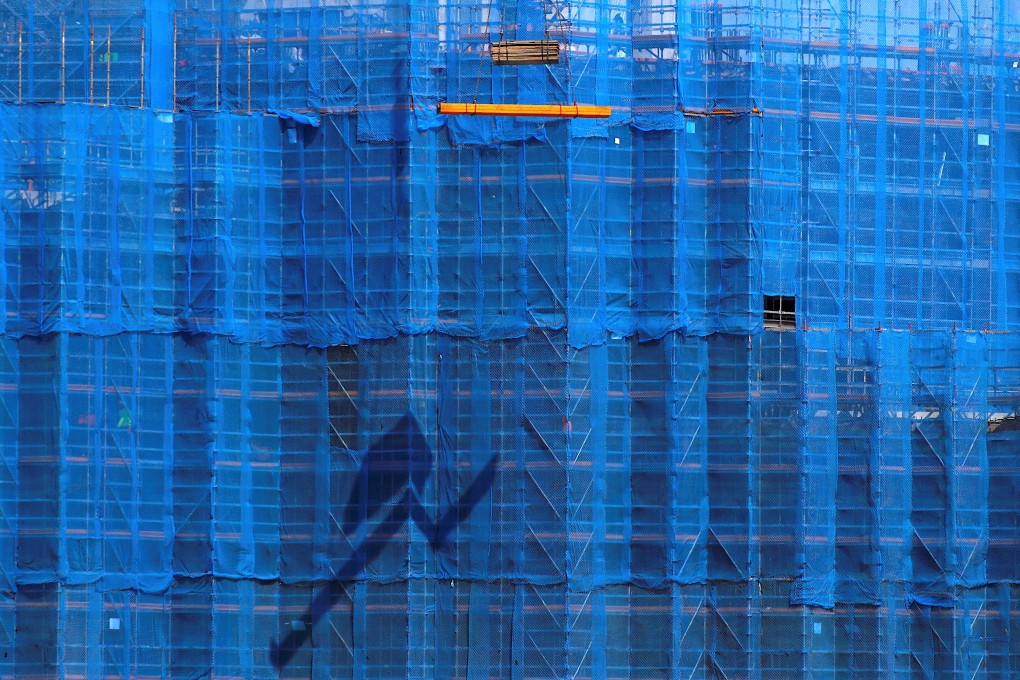 A construction site in central Sydney. The Reserve Bank of Australia, which delivered back-to-back rate cuts in June and July, has its work cut out given the official cash rate is already at an all-time low of 1 per cent. Photo: Reuters