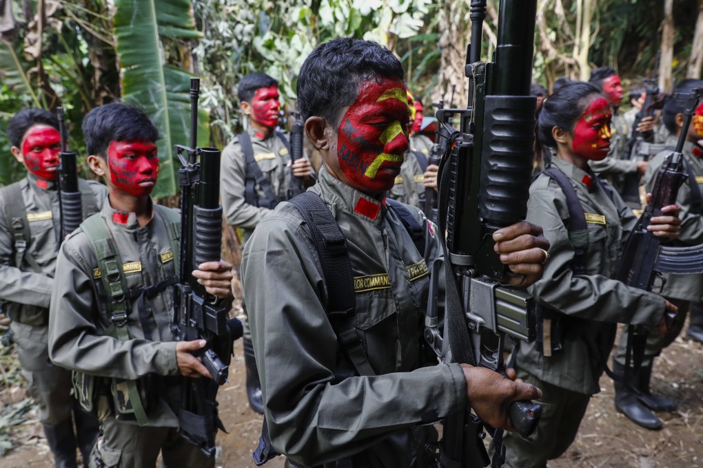 Fighters of the New People’s Army. Photo: EPA