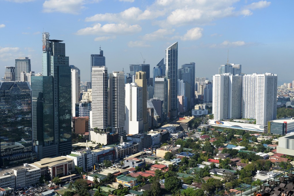 The skyline of the financial district of Makati in Manila. Photo: AFP