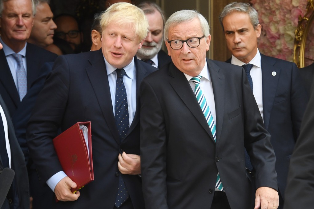 British Prime Minister Boris Johnson pictured with President of the European Commission Jean-Claude Juncker on Monday. Photo: DPA