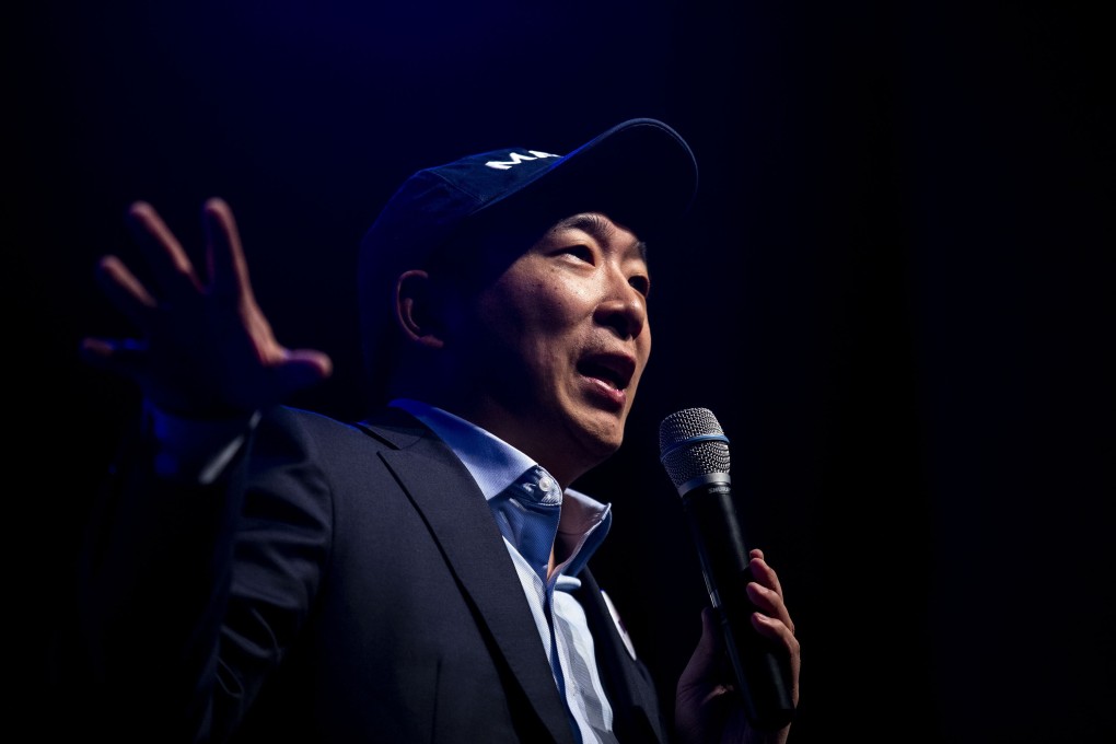 Democratic presidential candidate Andrew Yang answers questions from the audience during a town hall in Des Moines, Iowa, in April. Photo: The Des Moines Register via AP