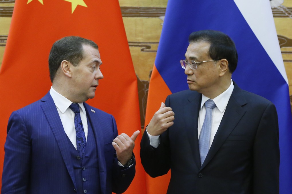 Russian Prime Minister Dmitry Medvedev (left) and Chinese Premier Li Keqiang at a previous meeting in Beijing. Photo: EPA-EFE