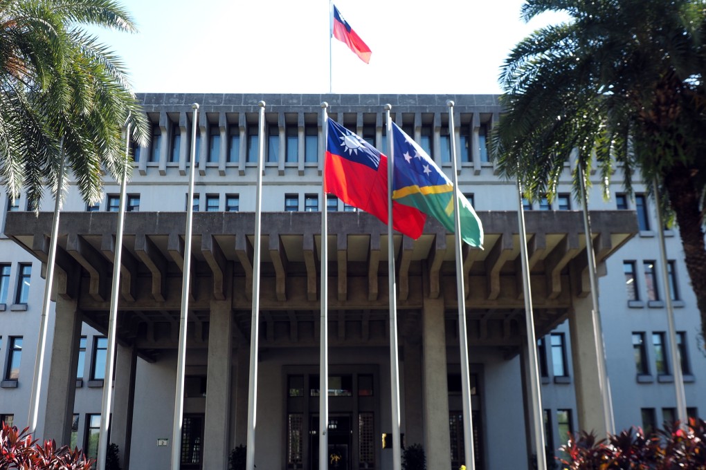 The flags of Taiwan (left) and the Solomon Islands outside Taiwan’s foreign ministry in Taipei. Photo: EPA-EFE