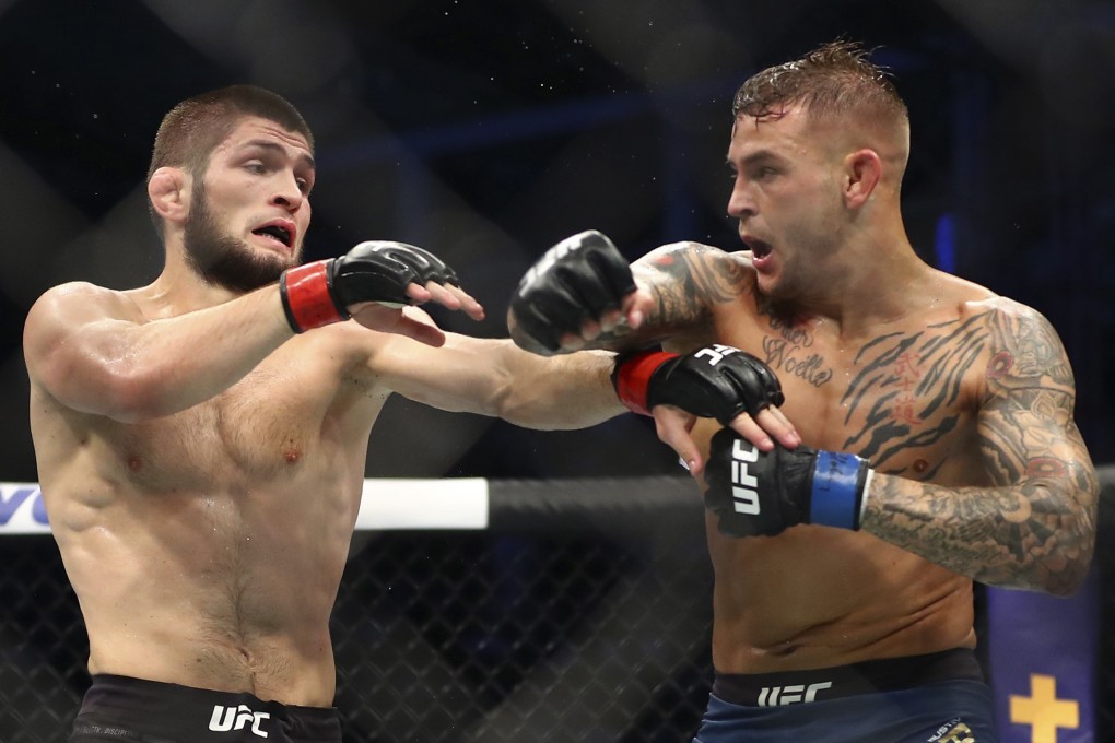 Dustin Poirier throws a punch at Khabib Nurmagomedov at UFC 242. Photo: AP