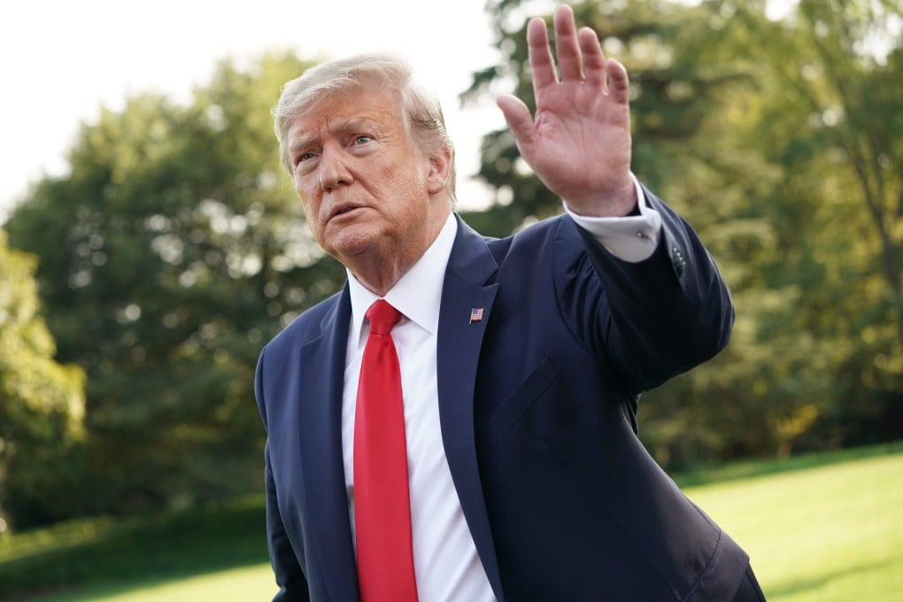 US President Donald Trump gestures as he departs the White House on Monday for a rally in New Mexico. Photo: AFP
